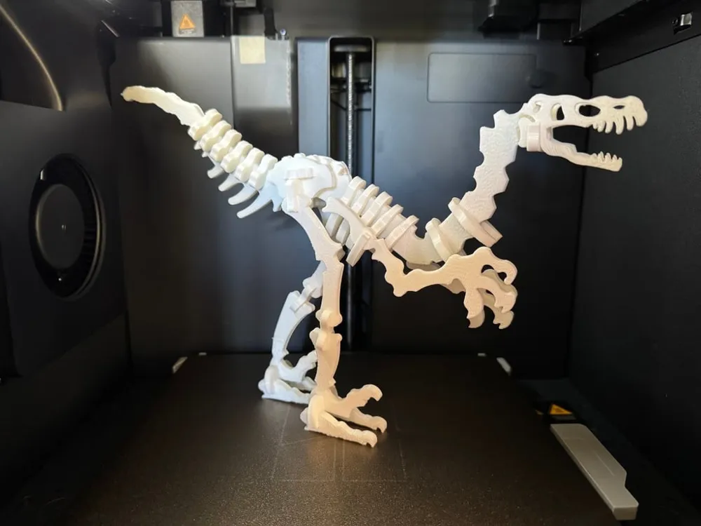 Quebra-cabeça de esqueleto de Velociraptor impresso em 3D e montado